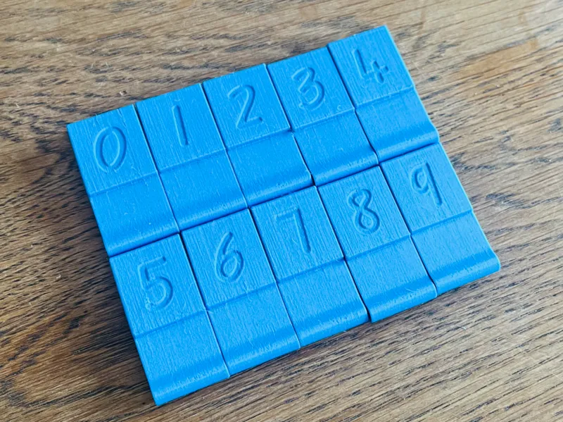 Numeral embossers