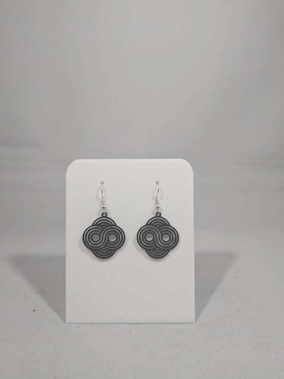 Abstract earrings - quadruple loop view 3