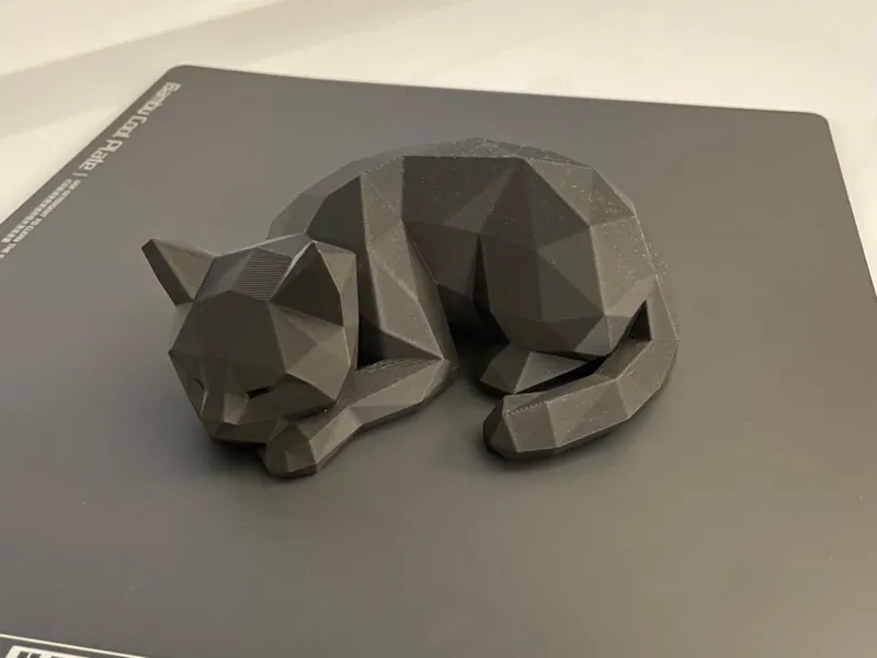 Sleeping Black Cat low-poly cat sculpture