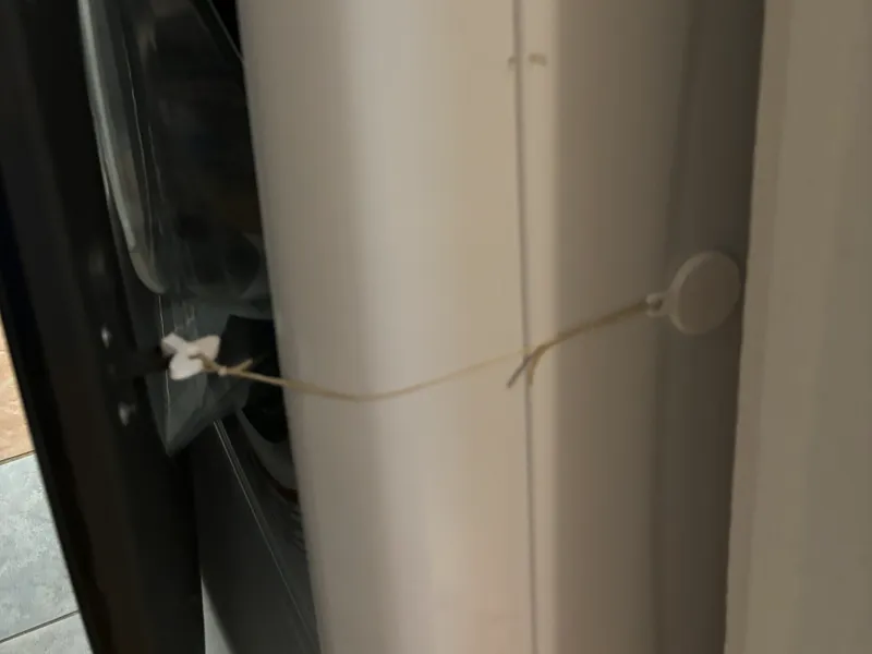 Washing machine hook