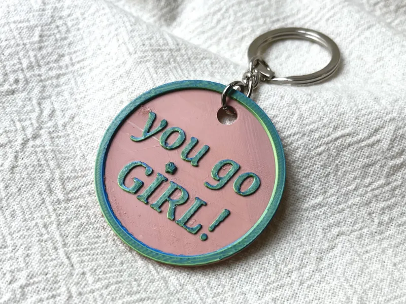 You go girl keychain