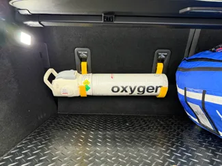 Oxygen cylinder isofix mount