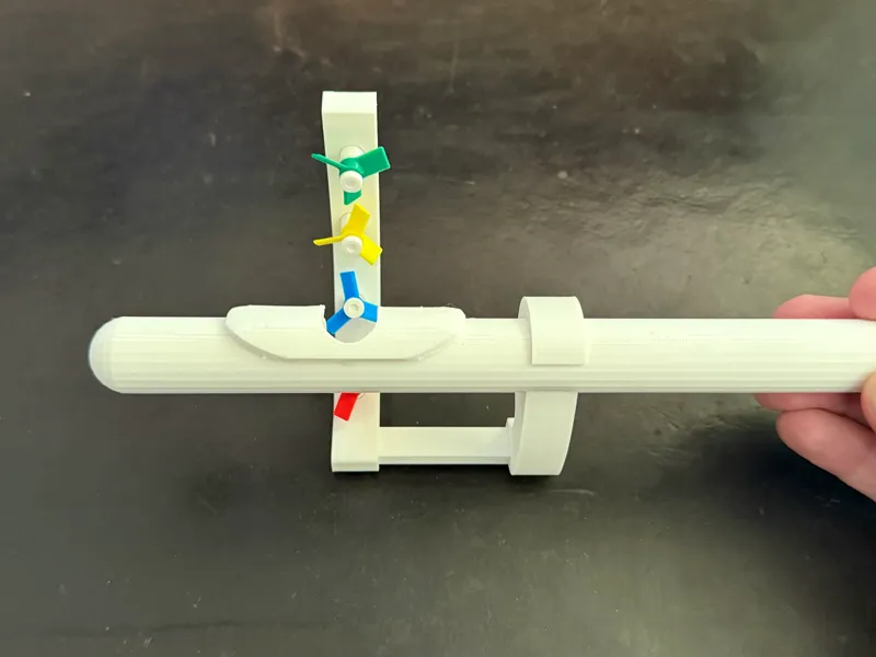 Flute training aid with updated fans