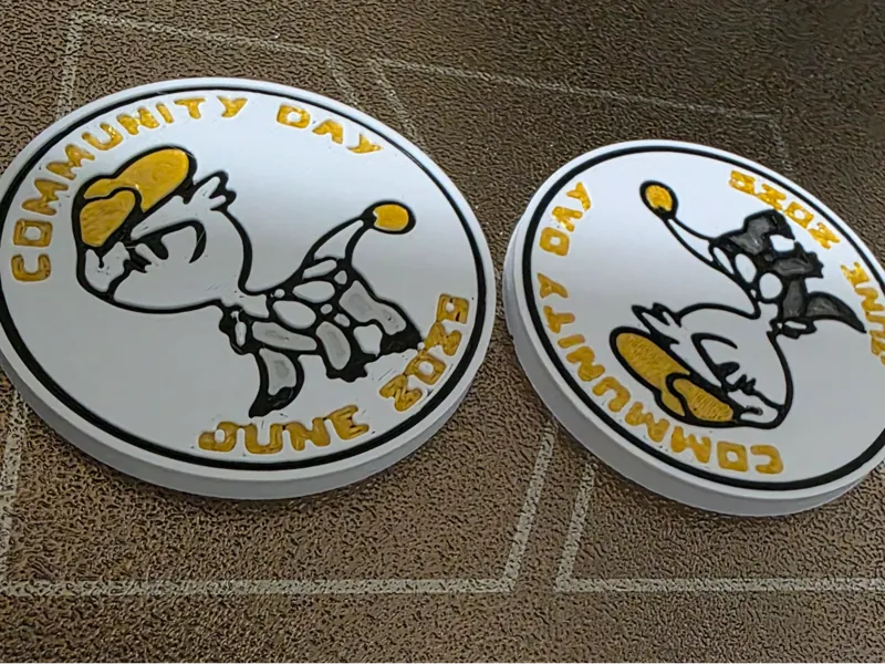 Pokemon Go Community Day #104 coin - Jangmo-o