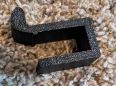 A hook to go on a shelf so you can hang a bag
