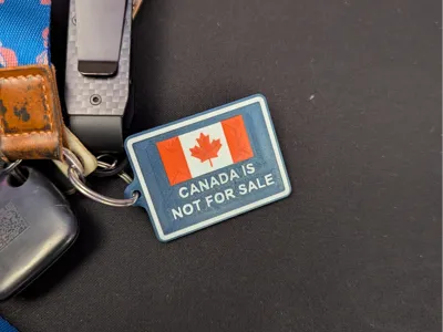 Canada is not for sale keychain (all caps text)