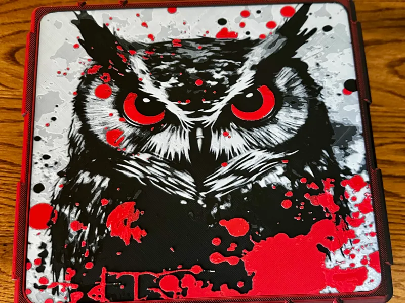 Black and Red Owl
