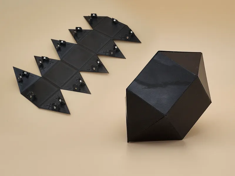 Magnetic folding prism