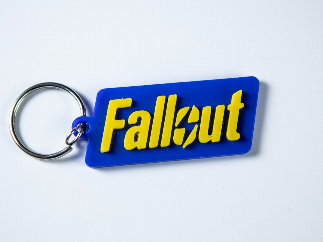 llavero con logotipo de fallout