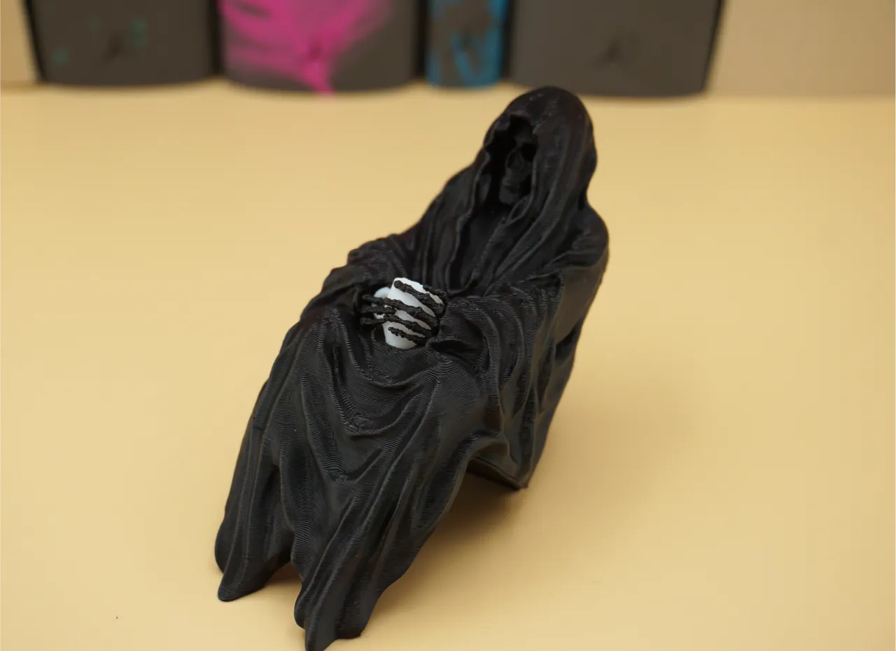 Sitting Grim Reaper with Teacup | (Book)shelf Deco view 2