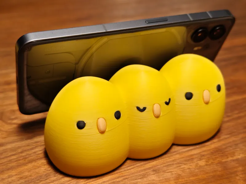 Adjustable chicks phone stand