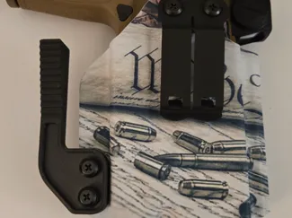 Holster claw with integrated wedge