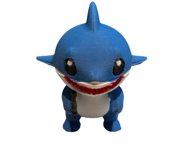 shark holding a gun