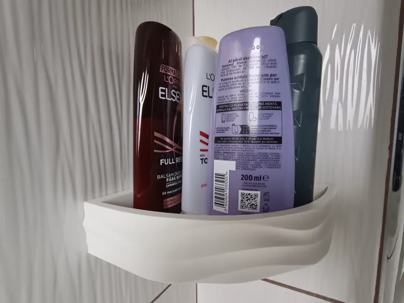 Wave pattern bath/shower corner tray
