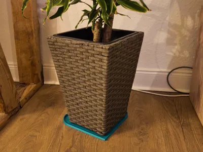 Flower pot coaster with simple drip edge