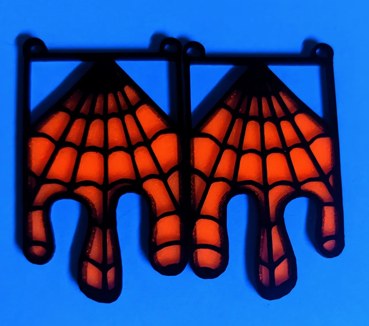 Dripping web earrings view 3