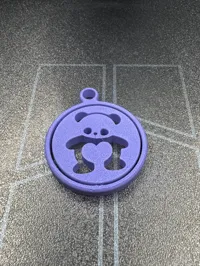 Porte-clés panda avec cœur rotatif — photo 5