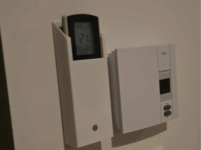 Heat pump controller holder