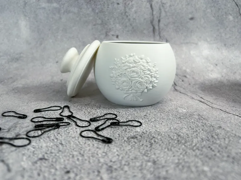 Decorative Jar with Embossed Floral Accent