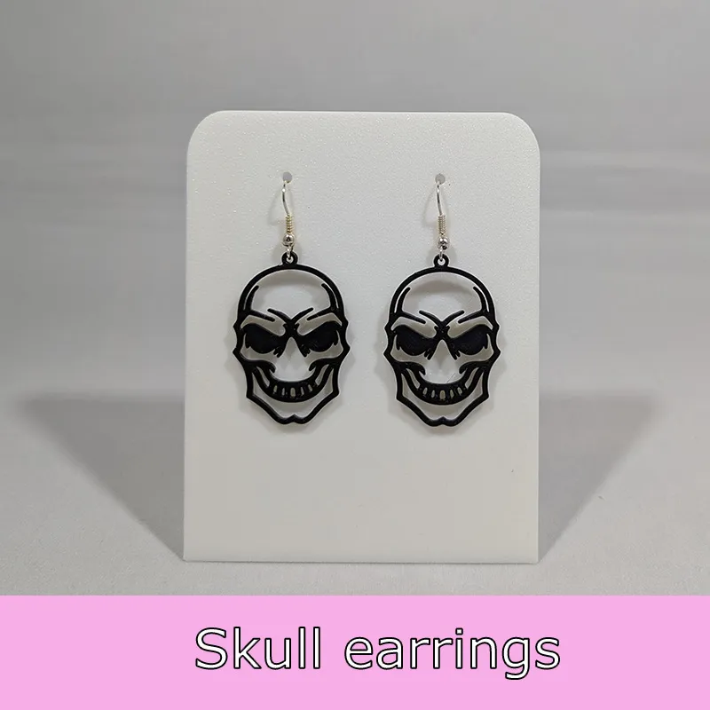 Skull earrings view 2