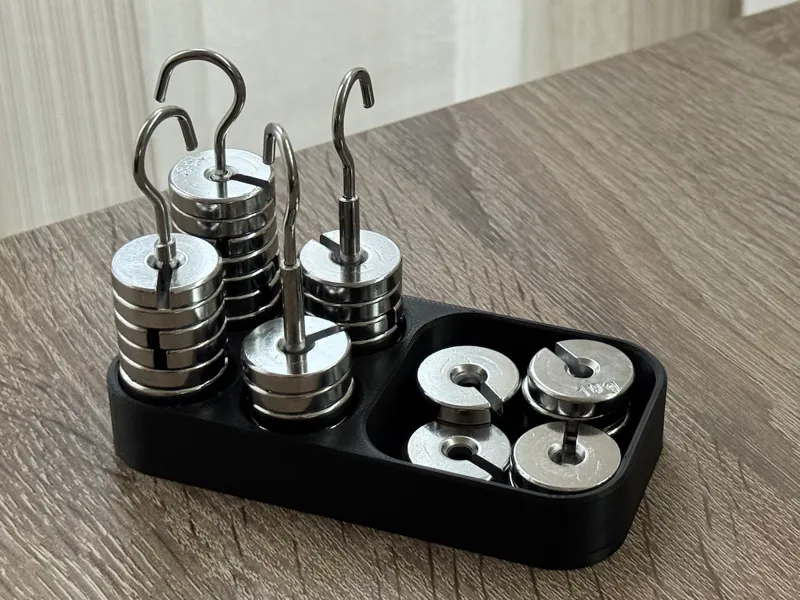 Holder for 4 weights, with tray for spare parts