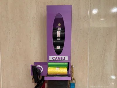 Dog bag dispenser with hanger