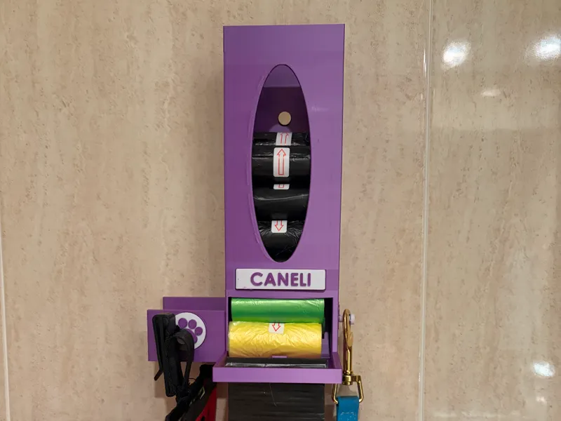Dispensador de bolsas para perros con colgador