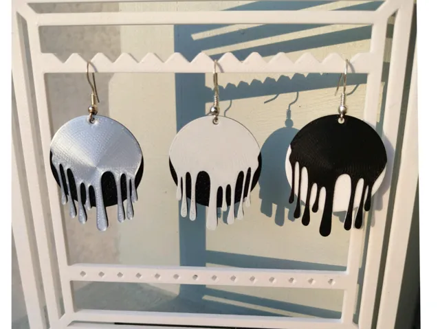 earring with a pattern of dripping paint