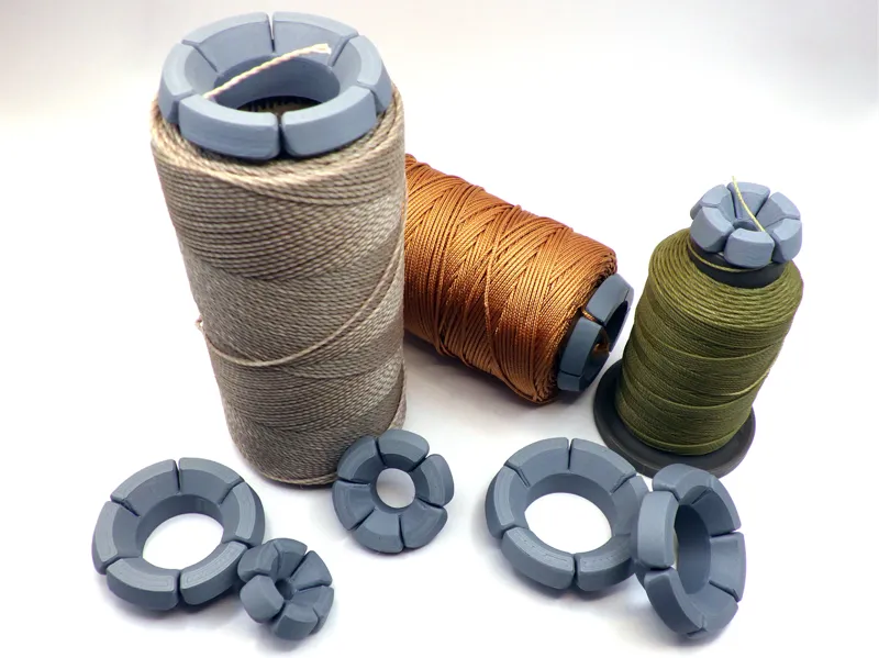 Spool cap that can secure the end of the thread. 