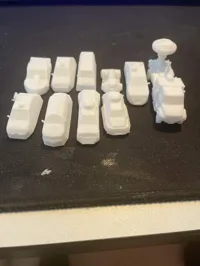 10 mini-véhicules chasseurs de tornades sur un plateau — photo 2