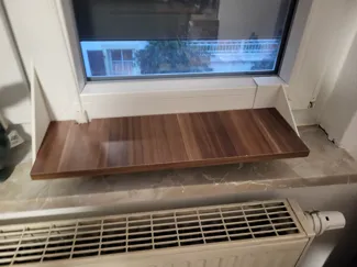 Fensterbankhalter