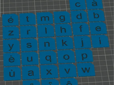 lowercase script alphabet with accented letters