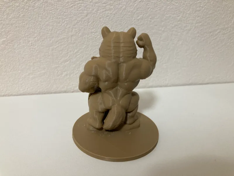 Muscular bear figurine