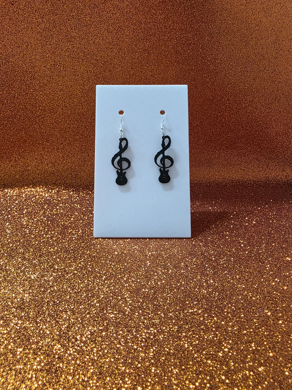 Guitar sol key earrings view 2