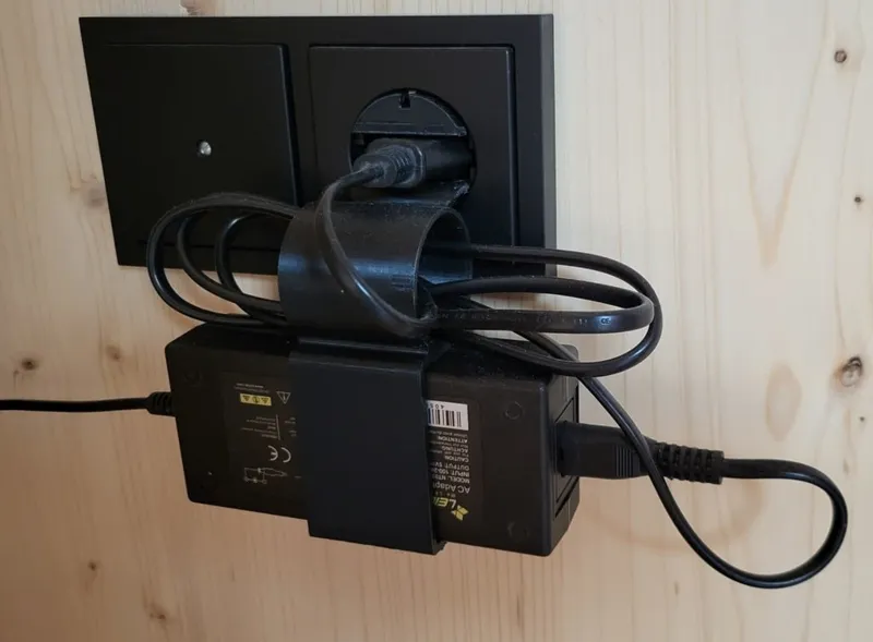 Power supply support including cable management