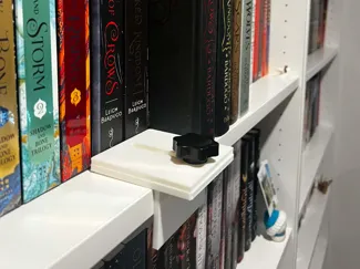Adjustable bookshelf aligning tool