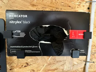 Wall-mounted holder for boxes