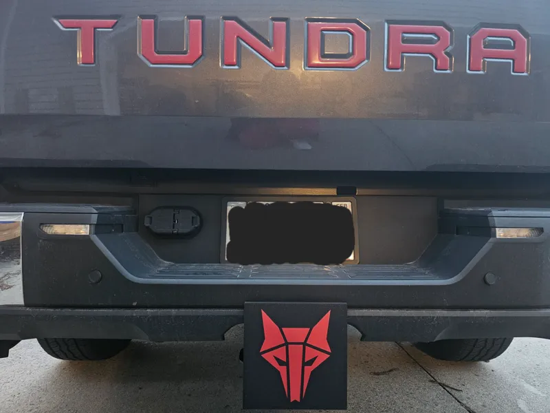 Red Rising Howler Truck Hitch Cover