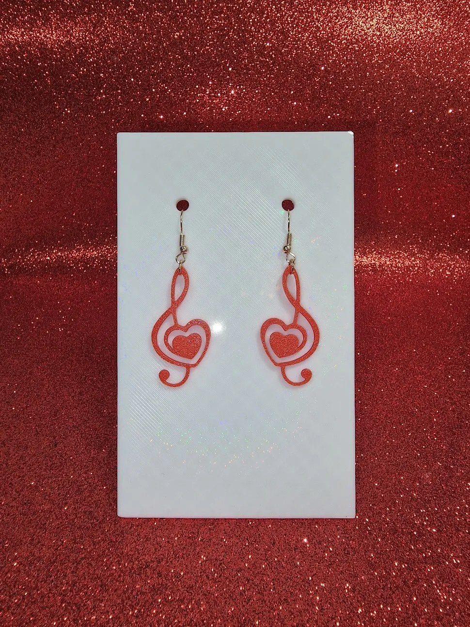 Heart in clef earrings view 2