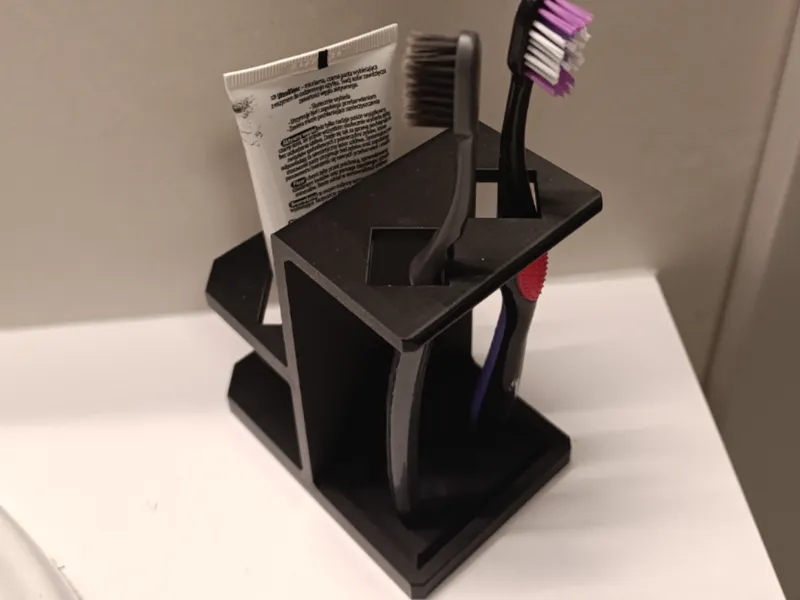 Toothbrush stand with place for toothpaste
