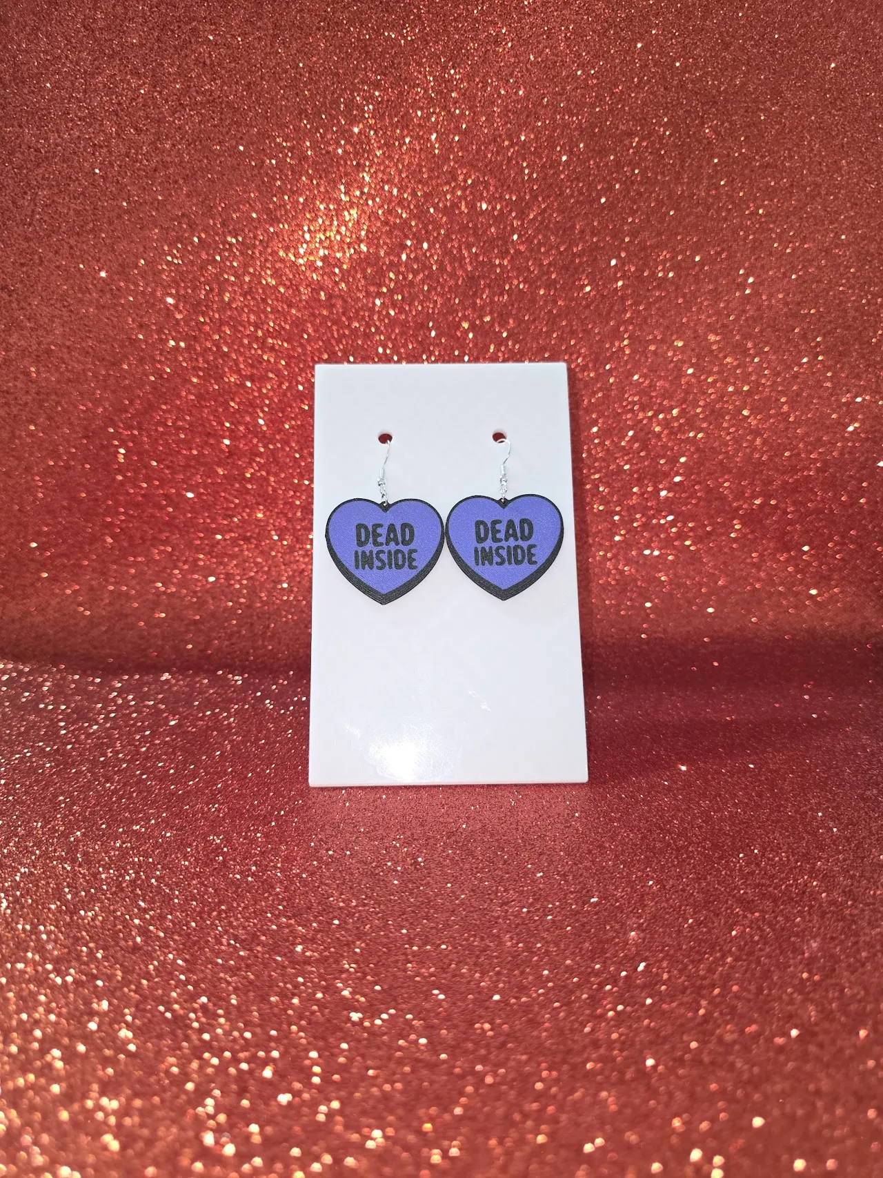 Dead inside earrings view 2