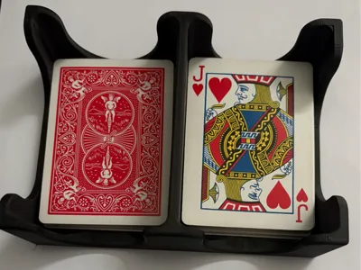 Two deck playing card holder with discard stack.