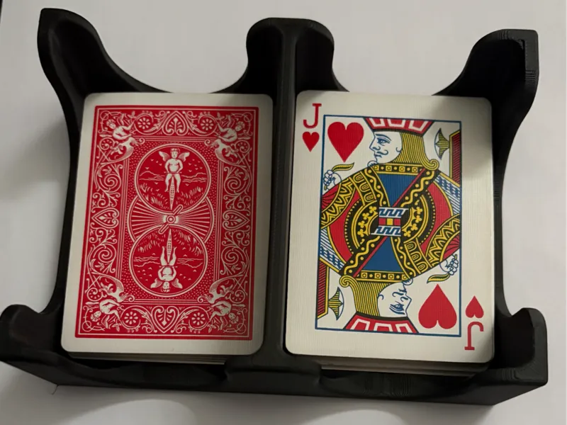 Two deck playing card holder with discard stack.