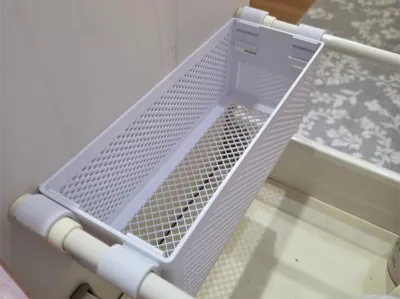 Auxiliary storage box for kitchen drawers