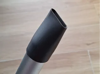 Ash vacuum nozzle for pellet stove
