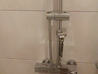 Razor holder for shower rail