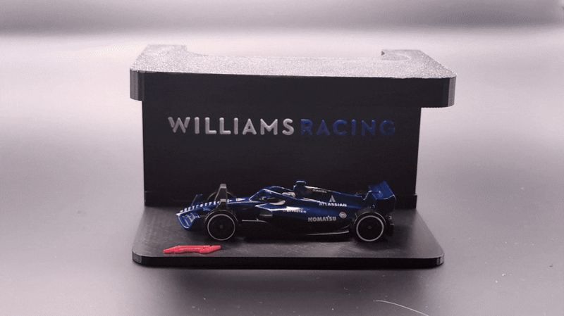 F1 2025 hot wheels stands with all team logos 