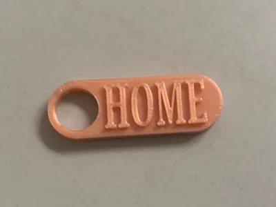 Keychain with " HOME " Titel