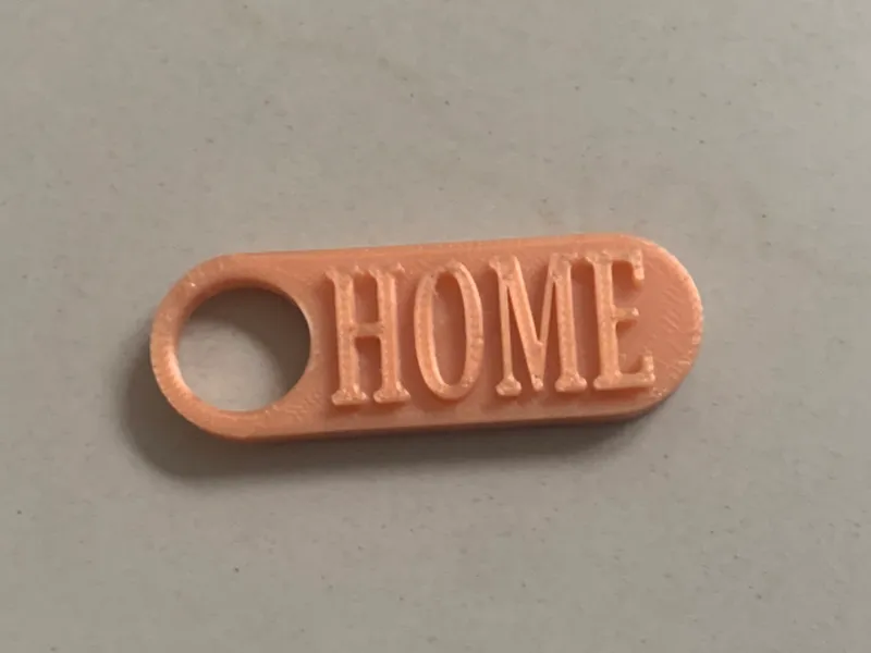 Keychain with " HOME " Titel