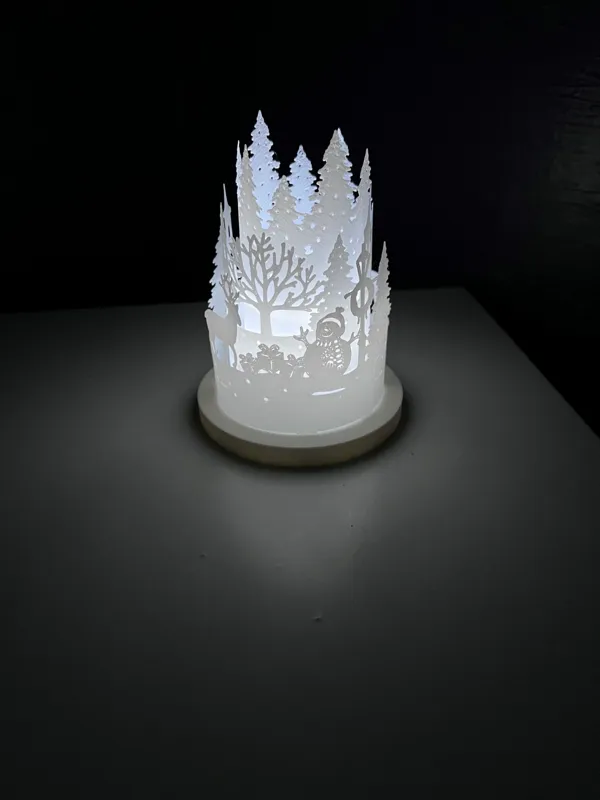 Lanterne ronde renne et bonhomme de neige